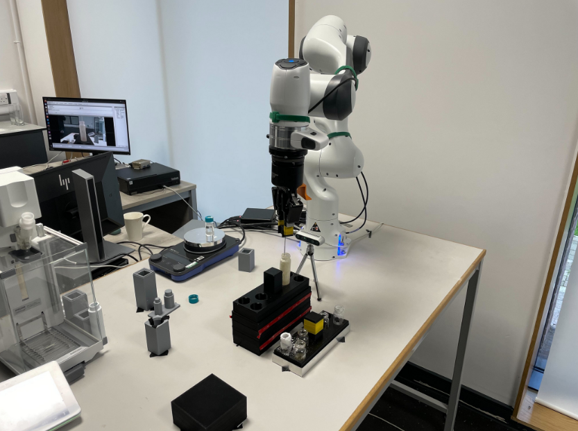 Autonomous robotic sample scraping setup